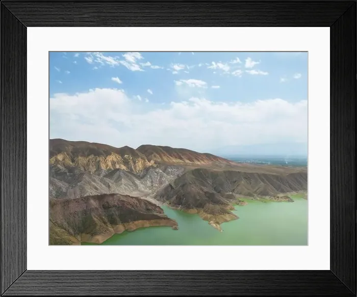 Framed Print : Aerial view on mountain lake. Drone over water reservoir at mountain valley Framed Print : Aerial view on mountain lake. Drone over water reservoir at mountain valley