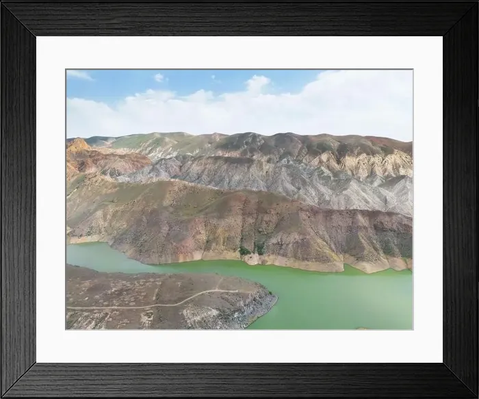 Framed Print : Aerial view on mountain lake. Drone over water reservoir at mountain valley Framed Print : Aerial view on mountain lake. Drone over water reservoir at mountain valley