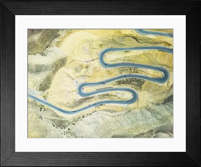 Framed Print : Top aerial view of snake curved road. Winding mountains road. View from above. Driveway serpentine with cars Framed Print : Top aerial view of snake curved road. Winding mountains road. View from above. Driveway serpentine with cars