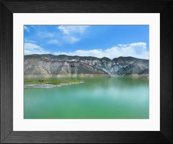 Framed Print : Aerial view on mountain lake. Drone view water reservoir at mountain valley Framed Print : Aerial view on mountain lake. Drone view water reservoir at mountain valley