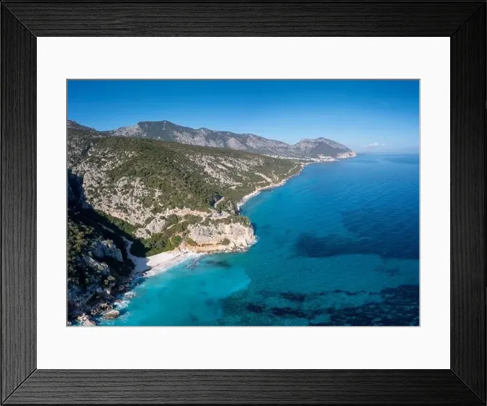 Framed Print : Aerial view of the rugged mountainous coast near Cala Gonone with turqouise water and small white sand beaches Framed Print : Aerial view of the rugged mountainous coast near Cala Gonone with turqouise water and small white sand beaches