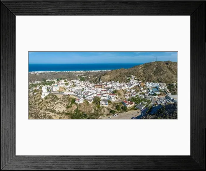 Framed Print : Picturesque spanish hillside white washed village of Mojacar during sunny day against blue sky Framed Print : Picturesque spanish hillside white washed village of Mojacar during sunny day against blue sky