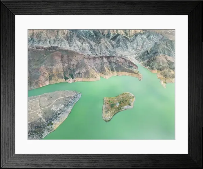 Framed Print : Aerial view on mountain lake. Drone view water reservoir at mountain valley Framed Print : Aerial view on mountain lake. Drone view water reservoir at mountain valley