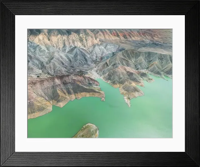Framed Print : Aerial view on mountain lake. Drone view water reservoir at mountain valley Framed Print : Aerial view on mountain lake. Drone view water reservoir at mountain valley