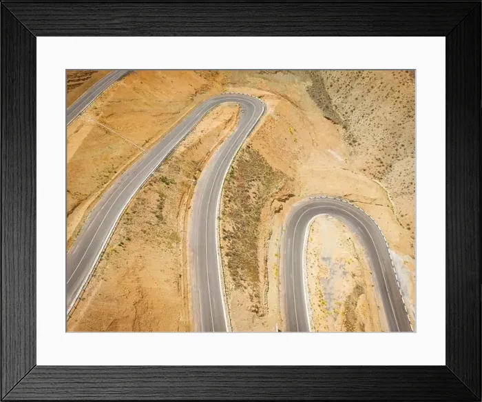 Framed Print : Top aerial view of snake curved road Framed Print : Top aerial view of snake curved road