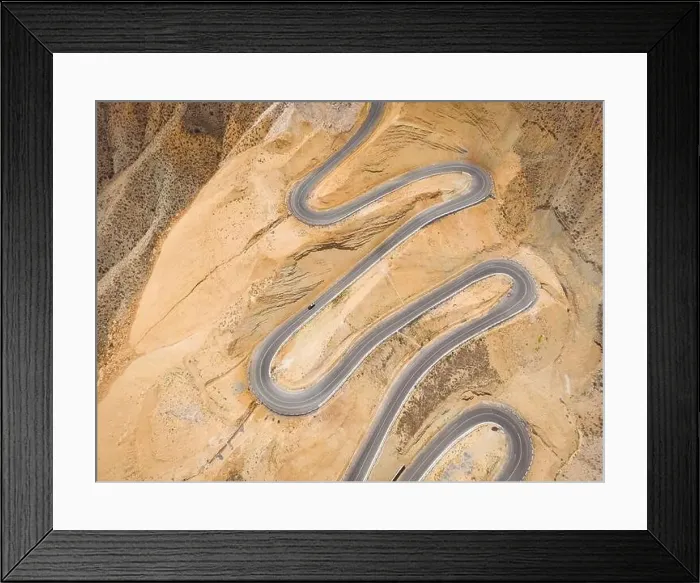 Framed Print : Top aerial view of snake curved road Framed Print : Top aerial view of snake curved road