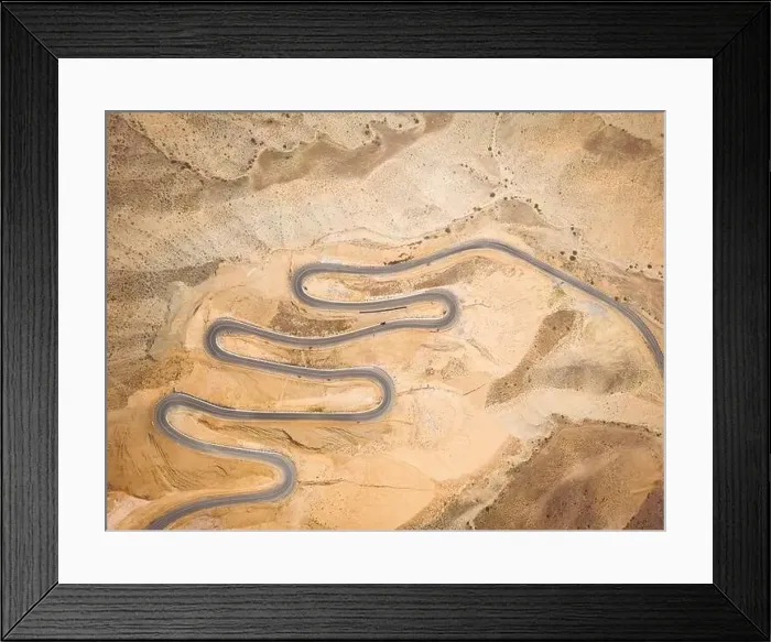 Framed Print : Top aerial view of snake curved road. Winding mountains road. View from above. Driveway serpentine with cars Framed Print : Top aerial view of snake curved road. Winding mountains road. View from above. Driveway serpentine with cars