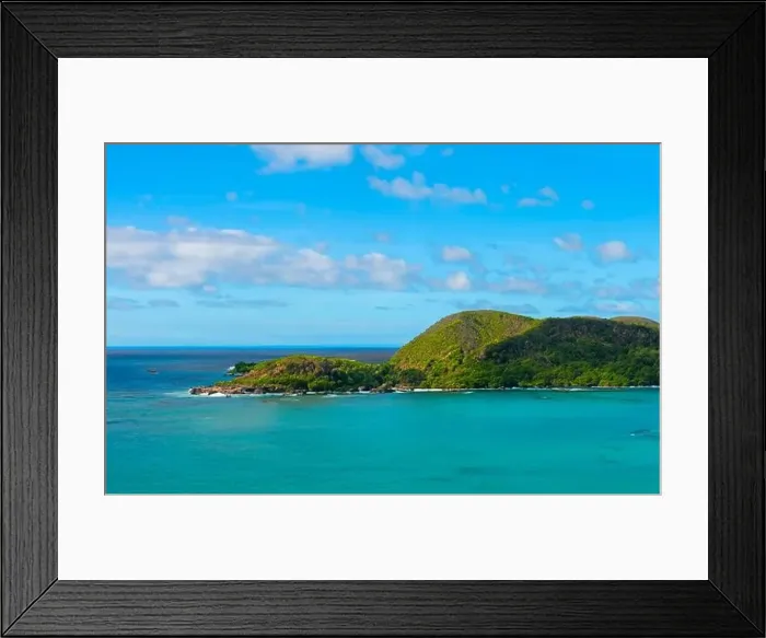 Framed Print : Turquoise waters on idyllic island in tropical climate. Mahoro Island, Indonesia Framed Print : Turquoise waters on idyllic island in tropical climate. Mahoro Island, Indonesia