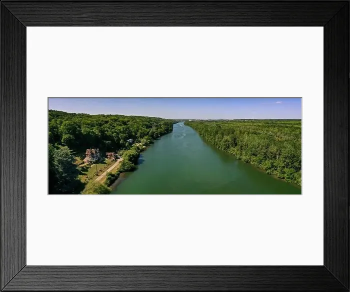Framed Print : aerial view on the Seine with a barge in Seine et Marne in France Framed Print : aerial view on the Seine with a barge in Seine et Marne in France