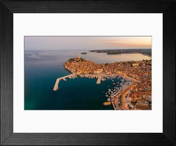 Framed Print : Panoramic aerial drone picture of the historic city Rovinj and harbor in Croatia during sunrise in summer Framed Print : Panoramic aerial drone picture of the historic city Rovinj and harbor in Croatia during sunrise in summer