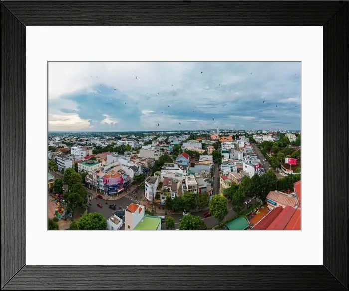Framed Print : July 31, 2022: downtown Buon Ma Thuot, Dak Lak Province, Vietnam Framed Print : July 31, 2022: downtown Buon Ma Thuot, Dak Lak Province, Vietnam