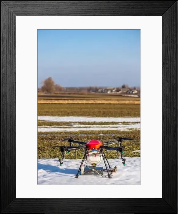 Framed Print : A beautiful red agrodron stands on the field Framed Print : A beautiful red agrodron stands on the field