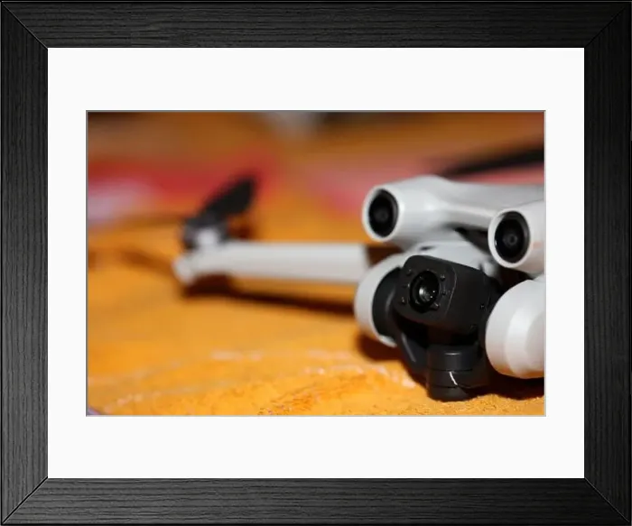 Framed Print : Drone with camera isolated on table close up colorful background modern aerial high quality big size instant prints Framed Print : Drone with camera isolated on table close up colorful background modern aerial high quality big size instant prints