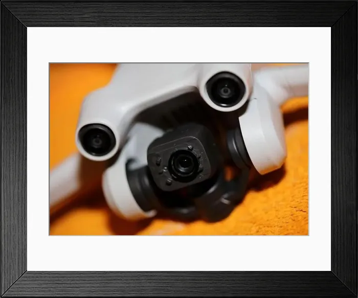 Framed Print : Drone with camera isolated on table close up colorful background modern aerial high quality big size instant prints Framed Print : Drone with camera isolated on table close up colorful background modern aerial high quality big size instant prints