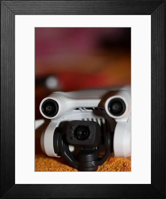 Framed Print : Drone with camera isolated on table close up colorful background modern aerial high quality big size instant prints Framed Print : Drone with camera isolated on table close up colorful background modern aerial high quality big size instant prints