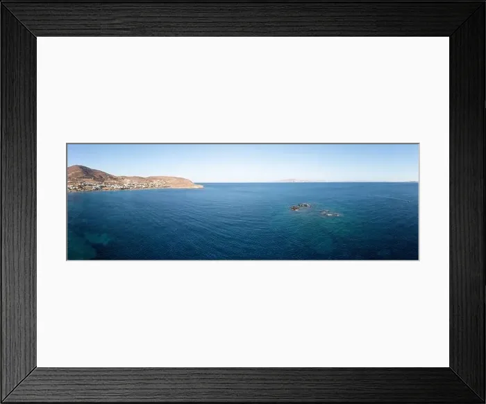 Framed Print : Tinos island, Cyclades Greece. Aerial panoramic view. Small villages with white houses on rocky land, blue sea and sky Framed Print : Tinos island, Cyclades Greece. Aerial panoramic view. Small villages with white houses on rocky land, blue sea and sky