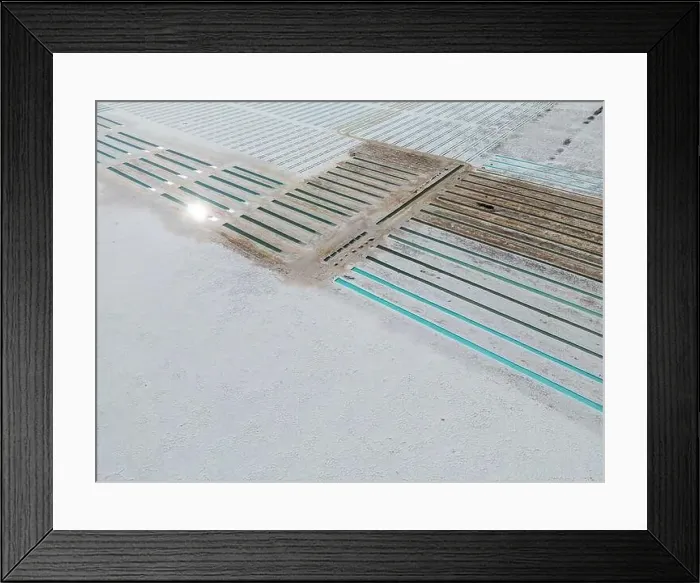 Framed Print : Aerial view of the salt basins in the salt crust of the huge salt flats Salinas Grandes de Jujuy in northern Argentina