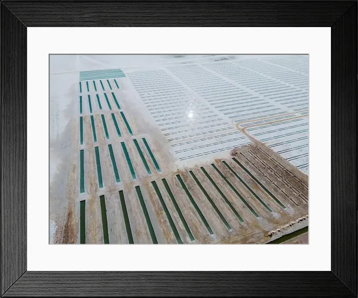 Framed Print : Aerial view of the salt basins in the salt crust of the huge salt flats Salinas Grandes de Jujuy in northern Argentina Framed Print : Aerial view of the salt basins in the salt crust of the huge salt flats Salinas Grandes de Jujuy in northern Argentina