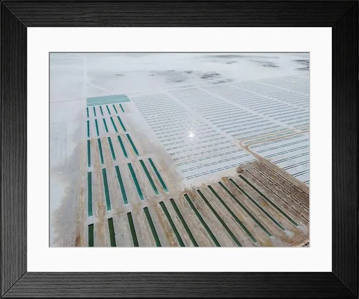 Framed Print : Aerial view of the salt basins in the salt crust of the huge salt flats Salinas Grandes de Jujuy in northern Argentina Framed Print : Aerial view of the salt basins in the salt crust of the huge salt flats Salinas Grandes de Jujuy in northern Argentina