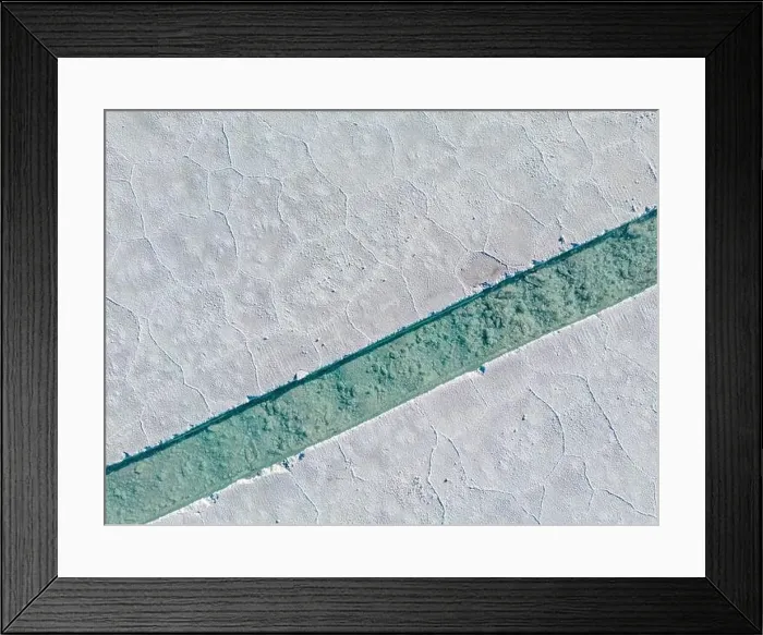 Framed Print : Aerial view of the salt basins in the salt crust of the huge salt flats Salinas Grandes de Jujuy in northern Argentina Framed Print : Aerial view of the salt basins in the salt crust of the huge salt flats Salinas Grandes de Jujuy in northern Argentina
