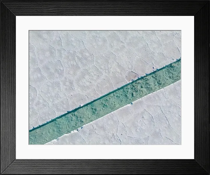 Framed Print : Aerial view of the salt basins in the salt crust of the huge salt flats Salinas Grandes de Jujuy in northern Argentina Framed Print : Aerial view of the salt basins in the salt crust of the huge salt flats Salinas Grandes de Jujuy in northern Argentina