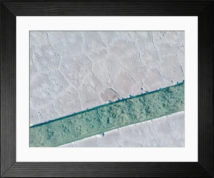 Framed Print : Aerial view of the salt basins in the salt crust of the huge salt flats Salinas Grandes de Jujuy in northern Argentina