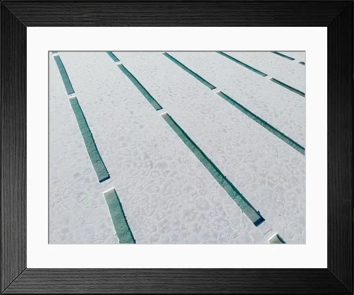 Framed Print : Aerial view of the salt basins in the salt crust of the huge salt flats Salinas Grandes de Jujuy in northern Argentina Framed Print : Aerial view of the salt basins in the salt crust of the huge salt flats Salinas Grandes de Jujuy in northern Argentina