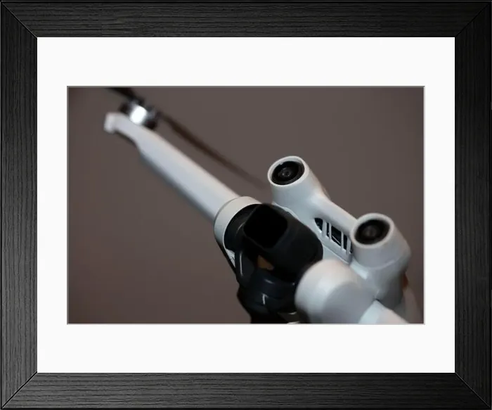 Framed Print : The drone copter flying with digital camera isolated on empty colorful background grey drones quad with sensors fly Framed Print : The drone copter flying with digital camera isolated on empty colorful background grey drones quad with sensors fly