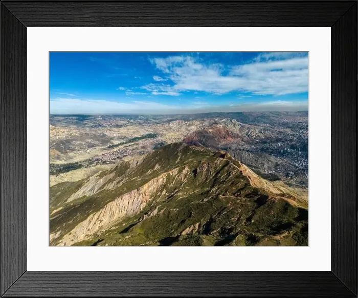 Framed Print : Aerial view from the impressive landmark Muela del Diablo over the mountains down into the valley with the cities La