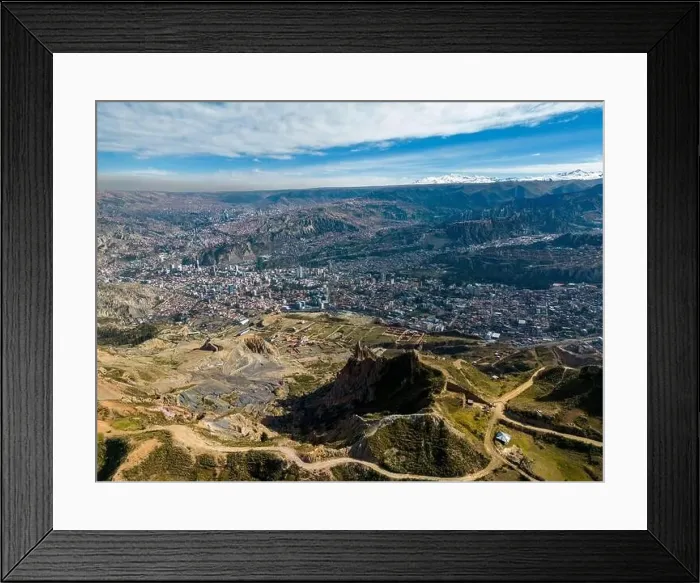 Framed Print : Aerial view from the impressive landmark Muela del Diablo over the mountains down into the valley with the cities La