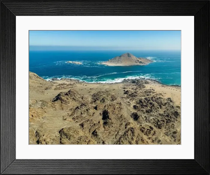 Framed Print : Aerial view of Isla Pan de Azúcar in the National Park Pan de Azúcar at the coast of the Atacama desert in Chile Framed Print : Aerial view of Isla Pan de Azúcar in the National Park Pan de Azúcar at the coast of the Atacama desert in Chile