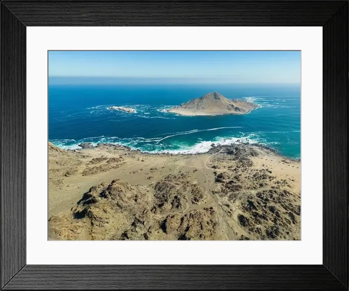 Framed Print : Aerial view of Isla Pan de Azúcar in the National Park Pan de Azúcar at the coast of the Atacama desert in Chile Framed Print : Aerial view of Isla Pan de Azúcar in the National Park Pan de Azúcar at the coast of the Atacama desert in Chile