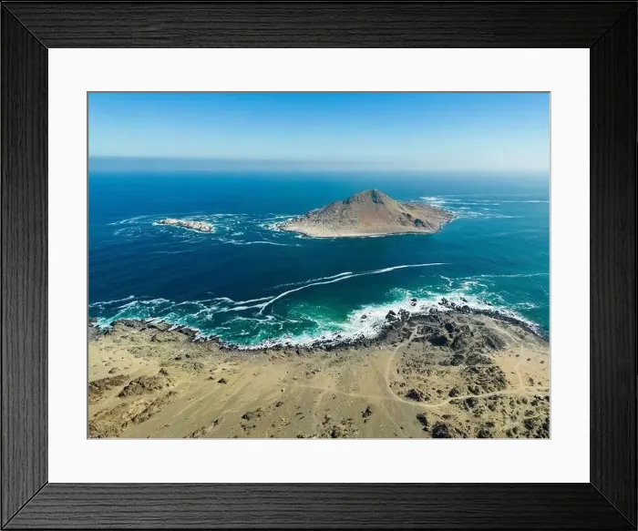Framed Print : Aerial view of Isla Pan de Azúcar in the National Park Pan de Azúcar at the coast of the Atacama desert in Chile