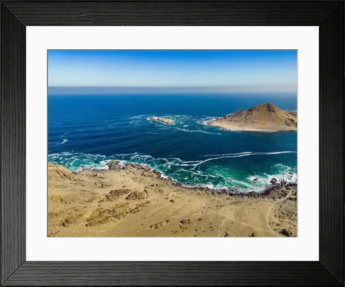 Framed Print : Aerial view of Isla Pan de Azúcar in the National Park Pan de Azúcar at the coast of the Atacama desert in Chile Framed Print : Aerial view of Isla Pan de Azúcar in the National Park Pan de Azúcar at the coast of the Atacama desert in Chile
