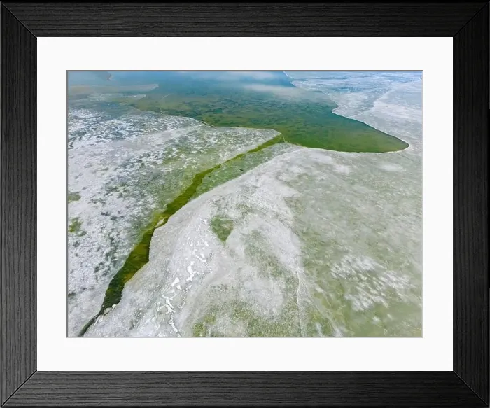 Framed Print : Aerial view of the green and partly frozen Laguna del Negro Francisco in the Atacama desert in Chile - Traveling