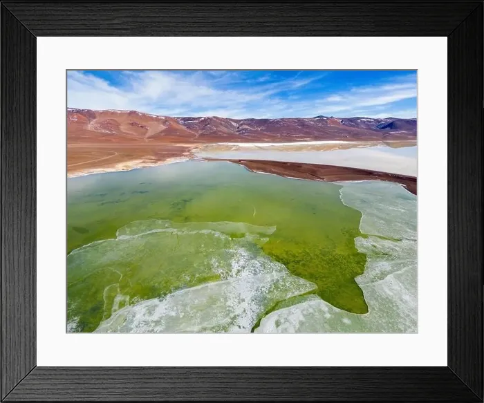 Framed Print : Aerial view of the green and partly frozen Laguna del Negro Francisco in the Atacama desert in Chile - Traveling
