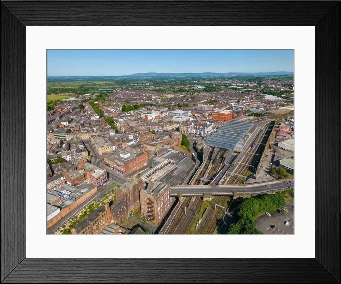 Framed Print : An aerial drone photo of the town center of Carlisle and the large train station with railways Framed Print : An aerial drone photo of the town center of Carlisle and the large train station with railways