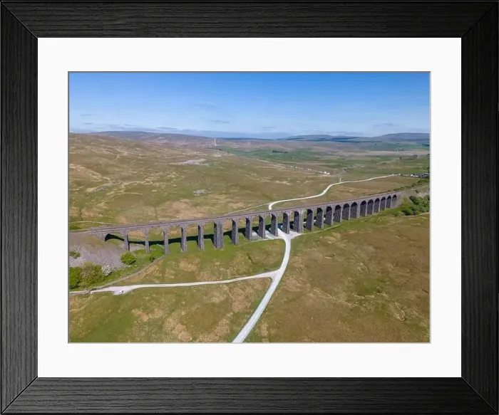 Framed Print : Aerial drone photo of the Ribblehead Viaduct. The large viaduct is a railway bridge in the Yorkshire Dales in England Framed Print : Aerial drone photo of the Ribblehead Viaduct. The large viaduct is a railway bridge in the Yorkshire Dales in England