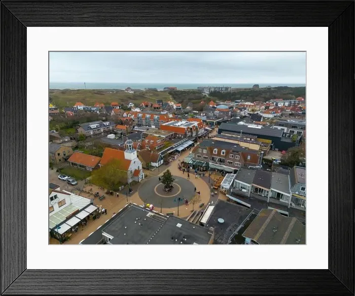 Framed Print : Aerial drone photo of the town square and church in de Koog Framed Print : Aerial drone photo of the town square and church in de Koog