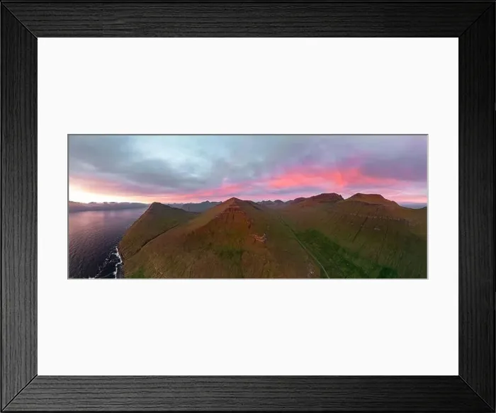 Framed Print : Scenic sky at sunrise over majestic mountains above the ocean, aerial view, Gjogv, Eysturoy Island, Faroe Islands Framed Print : Scenic sky at sunrise over majestic mountains above the ocean, aerial view, Gjogv, Eysturoy Island, Faroe Islands