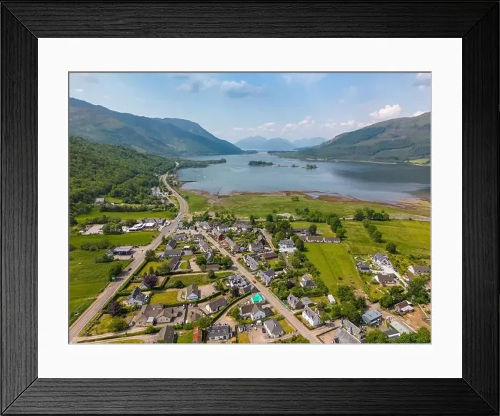 Framed Print : Aerial drone photo of the small village Glencoe. Glencoe is located between teh mountains of the Scottish Highlands