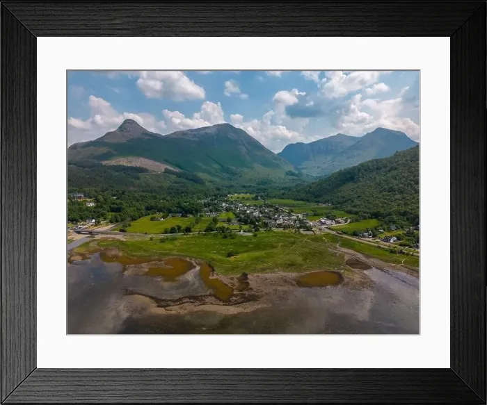 Framed Print : Aerial drone photo of the small village Glencoe. Glencoe is located between teh mountains of the Scottish Highlands Framed Print : Aerial drone photo of the small village Glencoe. Glencoe is located between teh mountains of the Scottish Highlands
