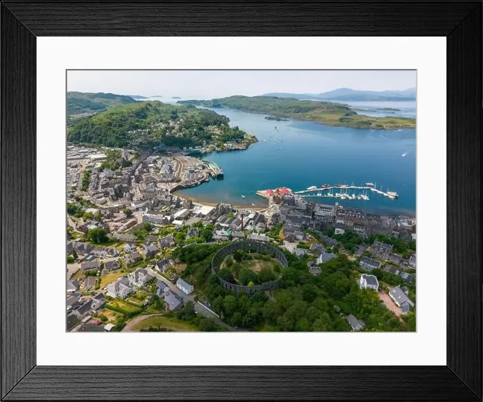 Framed Print : An aerial drone photo of the Mccaig's tower in Oban with a beautiful view over town and the bay Framed Print : An aerial drone photo of the Mccaig's tower in Oban with a beautiful view over town and the bay