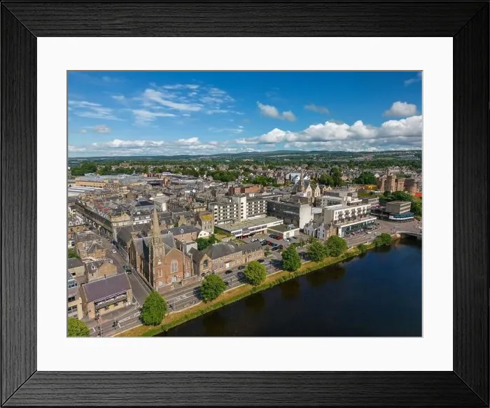 Framed Print : Aerial drone photo of the town centre and churches in Inverness next to the river Ness in Scotland Framed Print : Aerial drone photo of the town centre and churches in Inverness next to the river Ness in Scotland