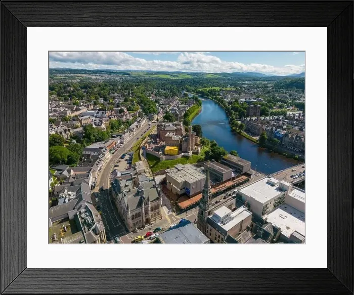 Framed Print : Aerial drone photo of the town centre and churches in Inverness next to the river Ness in Scotland Framed Print : Aerial drone photo of the town centre and churches in Inverness next to the river Ness in Scotland