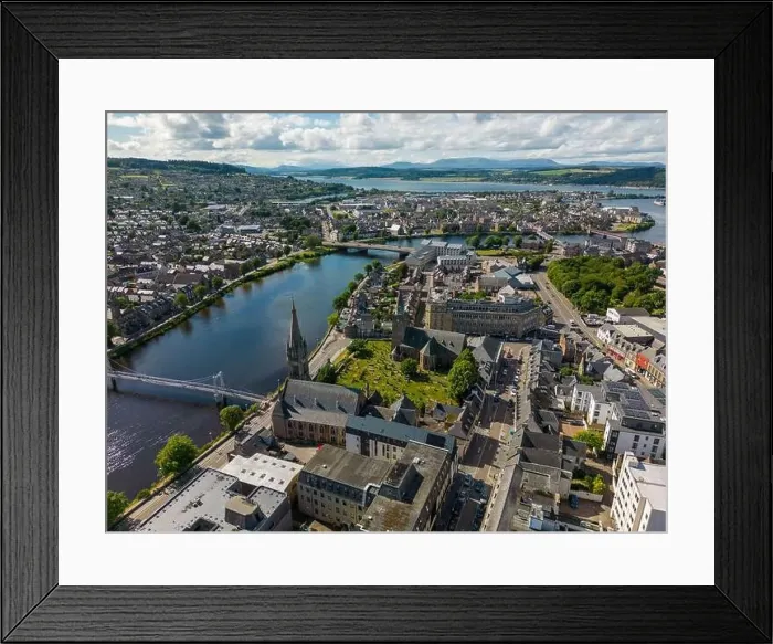 Framed Print : Aerial drone photo of the town centre and churches in Inverness next to the river Ness in Scotland Framed Print : Aerial drone photo of the town centre and churches in Inverness next to the river Ness in Scotland