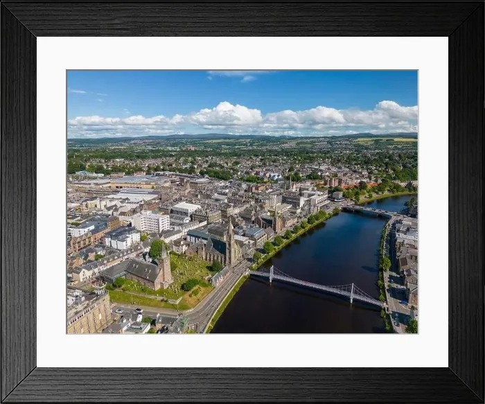 Framed Print : Aerial drone photo of the town centre and churches in Inverness next to the river Ness in Scotland Framed Print : Aerial drone photo of the town centre and churches in Inverness next to the river Ness in Scotland