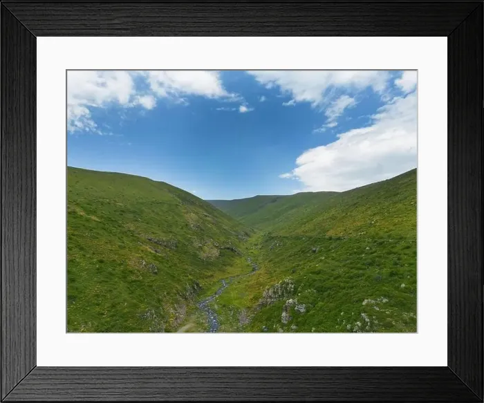 Framed Print : Aerial view mountain. Scenic aerial view from forest to mountain ridge. Above green landscape with sunlight mountains Framed Print : Aerial view mountain. Scenic aerial view from forest to mountain ridge. Above green landscape with sunlight mountains