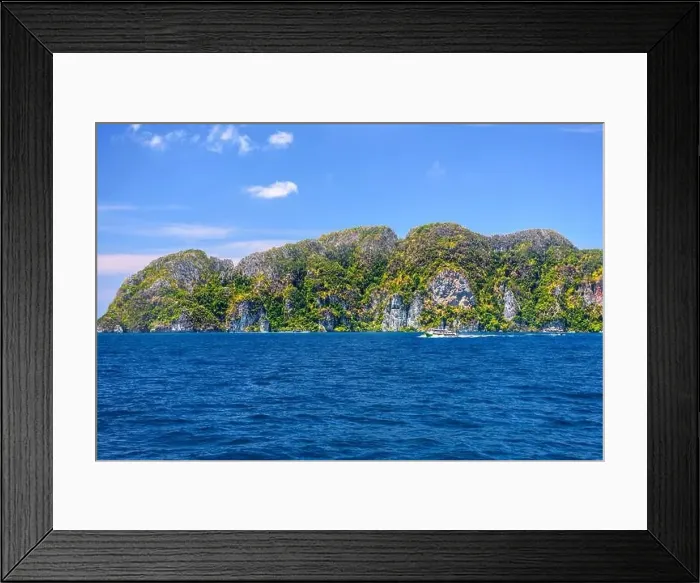 Framed Print : Motor ship in the bay of Ko Phi Phi Don Island with huge rocks and cliffs on a sunny day Framed Print : Motor ship in the bay of Ko Phi Phi Don Island with huge rocks and cliffs on a sunny day