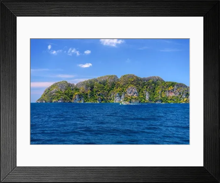 Framed Print : Motor ship in the bay of Ko Phi Phi Don Island with huge rocks and cliffs on a sunny day Framed Print : Motor ship in the bay of Ko Phi Phi Don Island with huge rocks and cliffs on a sunny day